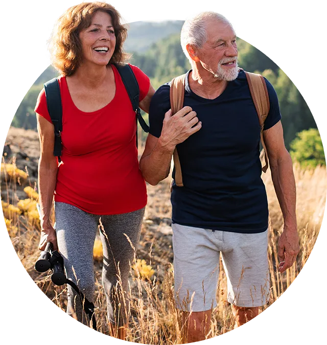 Couple hiking in tall grass